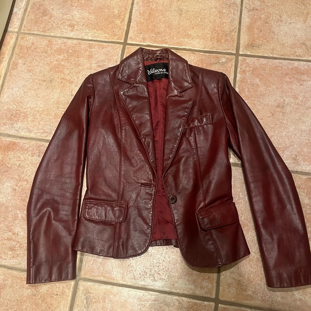 Wilson’s vintage burgundy leather jacket. Size 6